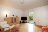 Wohnzimmer - Charmante 3-Zimmer-Wohnung mit Terrasse & Garten in ruhiger, zentraler Lage