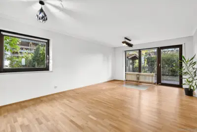GEORGI: Mehr Platz als gedacht: Gartenmaisonette mit ca. 105 m² Wohn-/Nutzfläche, 81671 München, Erdgeschosswohnung