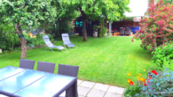 Gartenansicht - Doppelhaushälfte mit idyllischem Garten und großem Hobbyraum – ideal für Familien