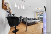 Wohnzimmer - GEORGI: Attraktive 2‑Zimmerwohnung in zentraler Lage von Germering